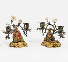 Pair of candelabra with Chinese figurines