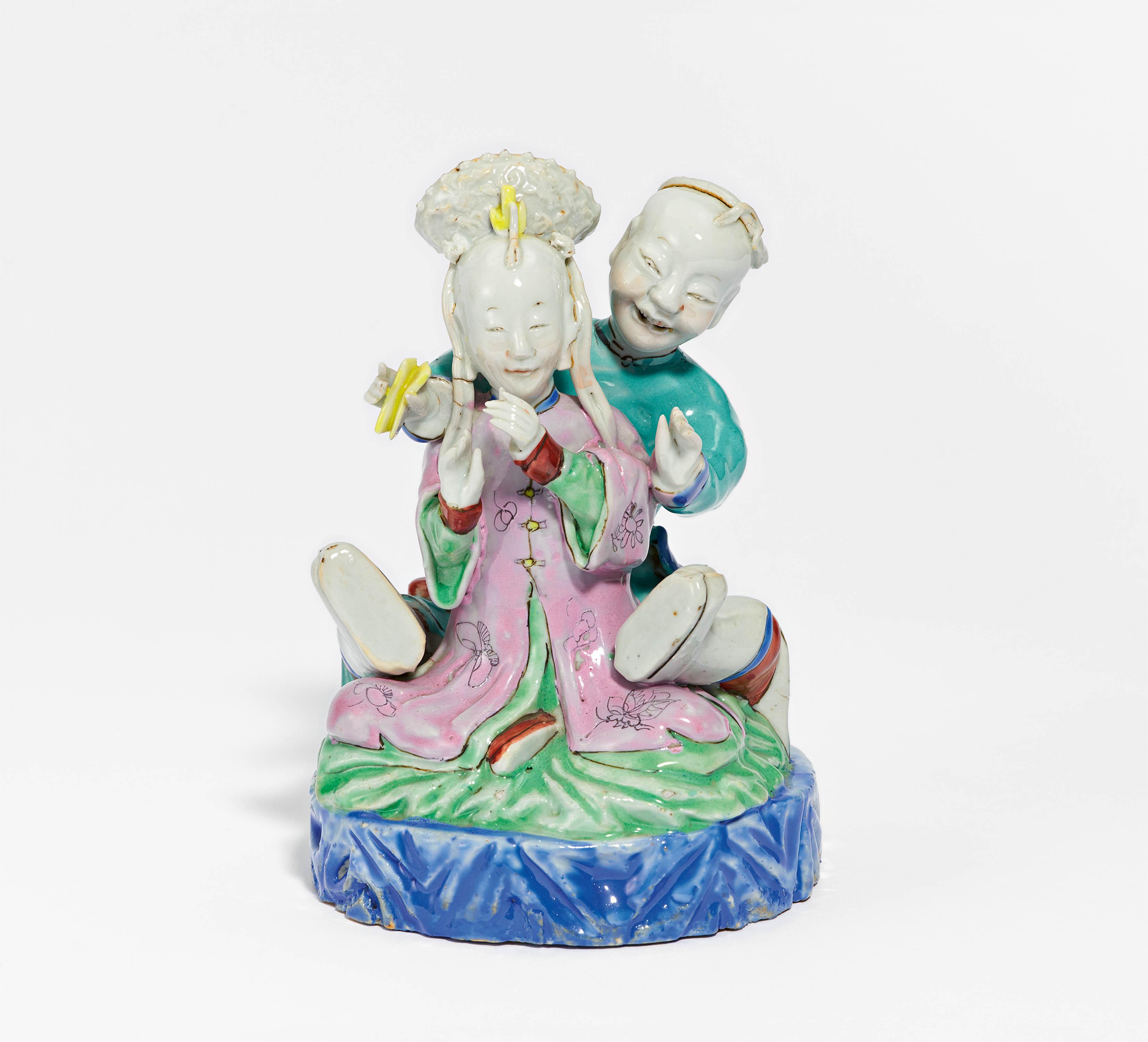 Famille rose figurines of a couple