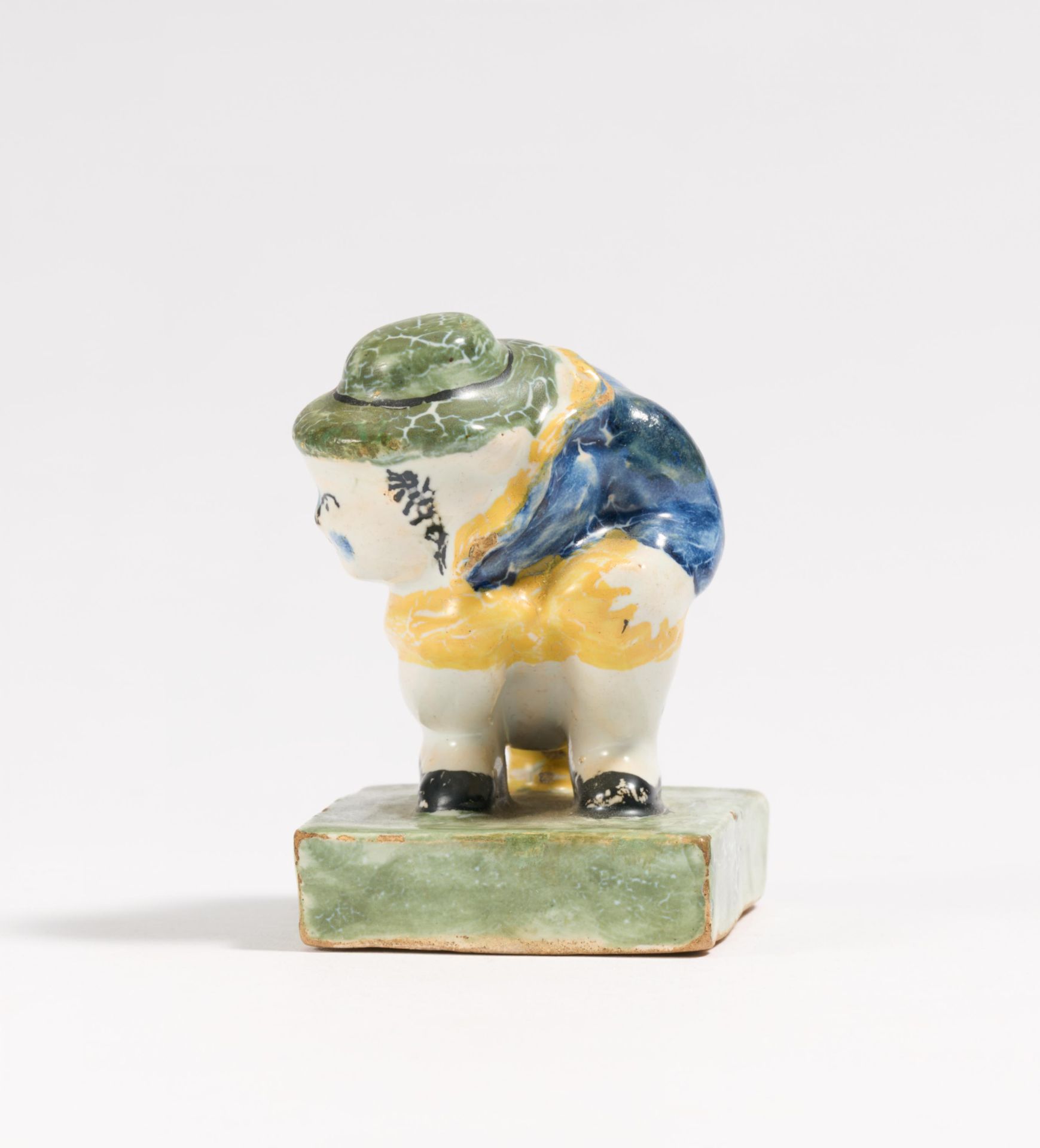 Small figurine of squatting man on chamber pot - Image 2 of 4