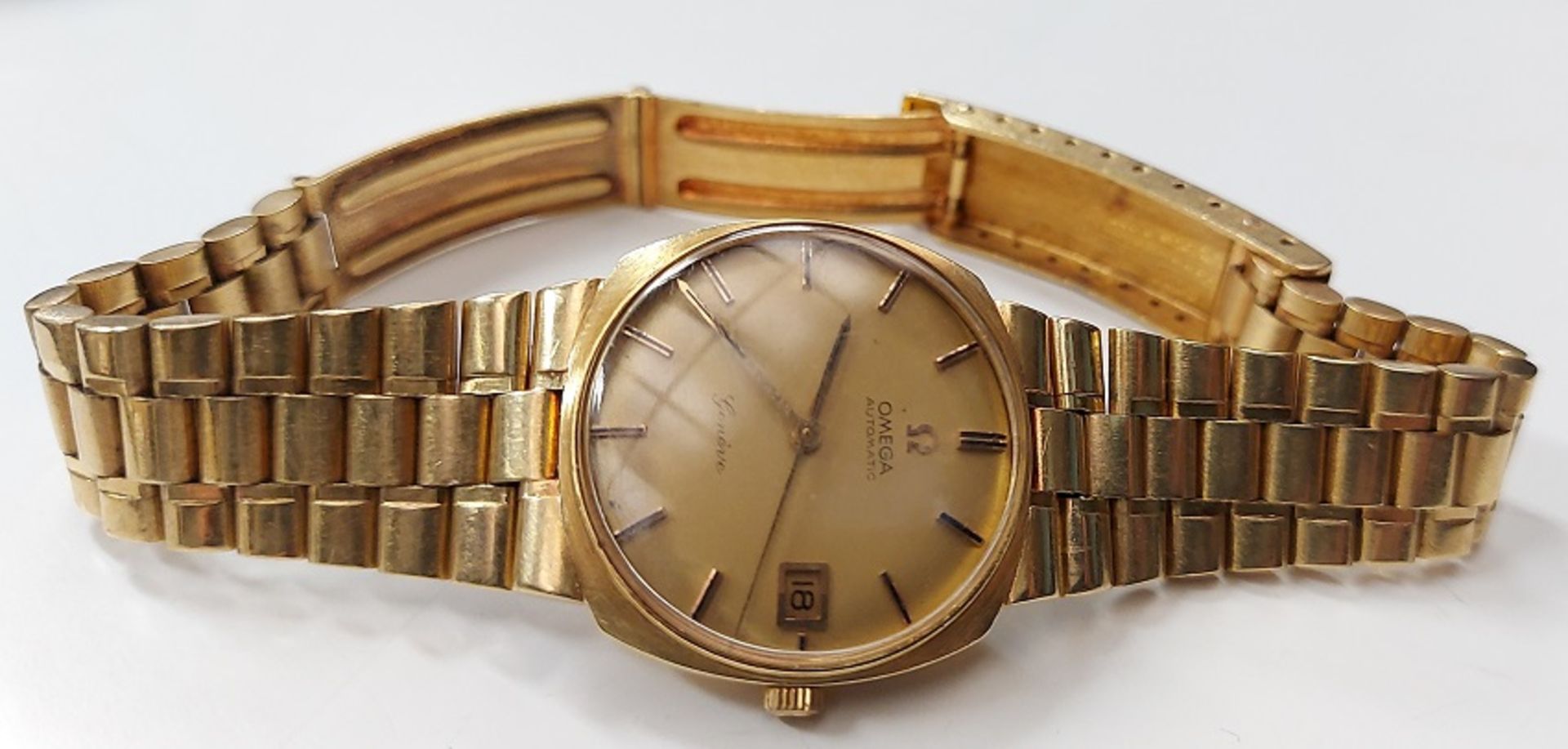 Schöne alte 750er 18K HAU OMEGA GENEVE AUTOMATIC HERRENUHR