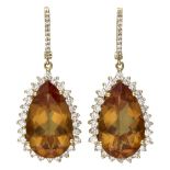 18K. Yellow gold Mimoza cocktail earrings set with approx. 1.67 ct. diamond and colored stones.