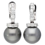 18K. White gold Damiani earrings set with approx. 0.80 ct. diamond and Tahiti pearl.