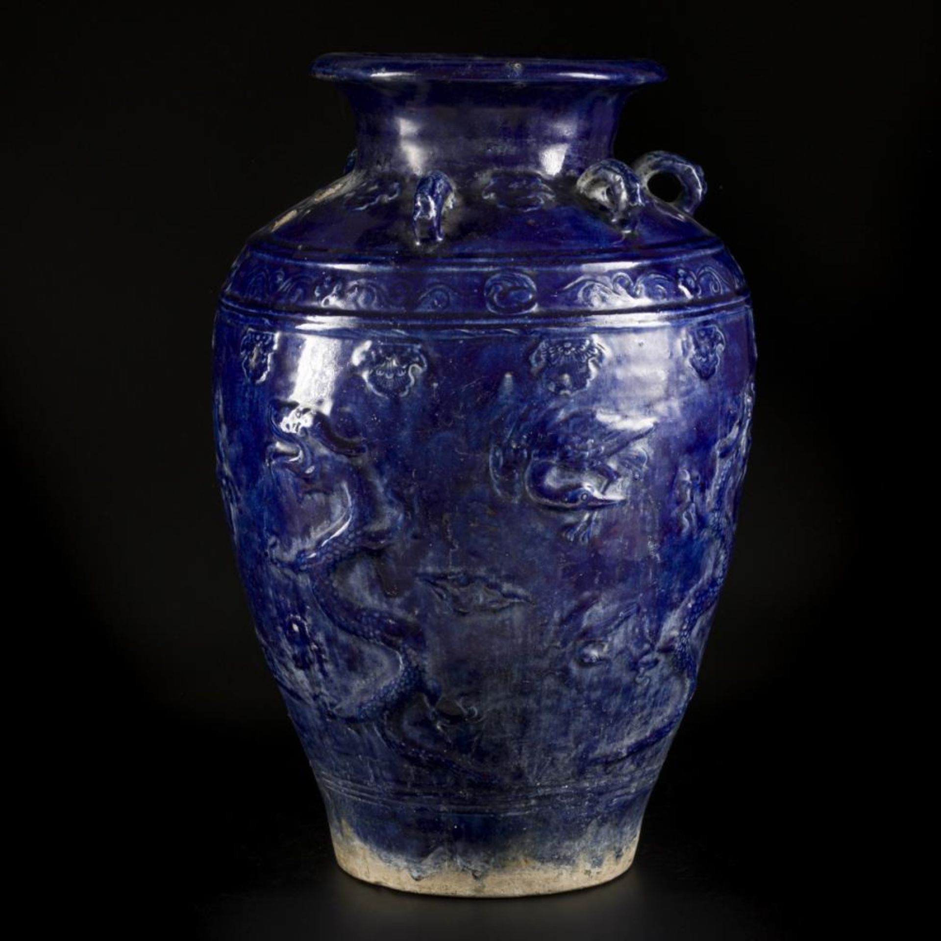 An earthenware blue glazed storage jar with dragon decoration, China, 19/20th century. - Image 7 of 18