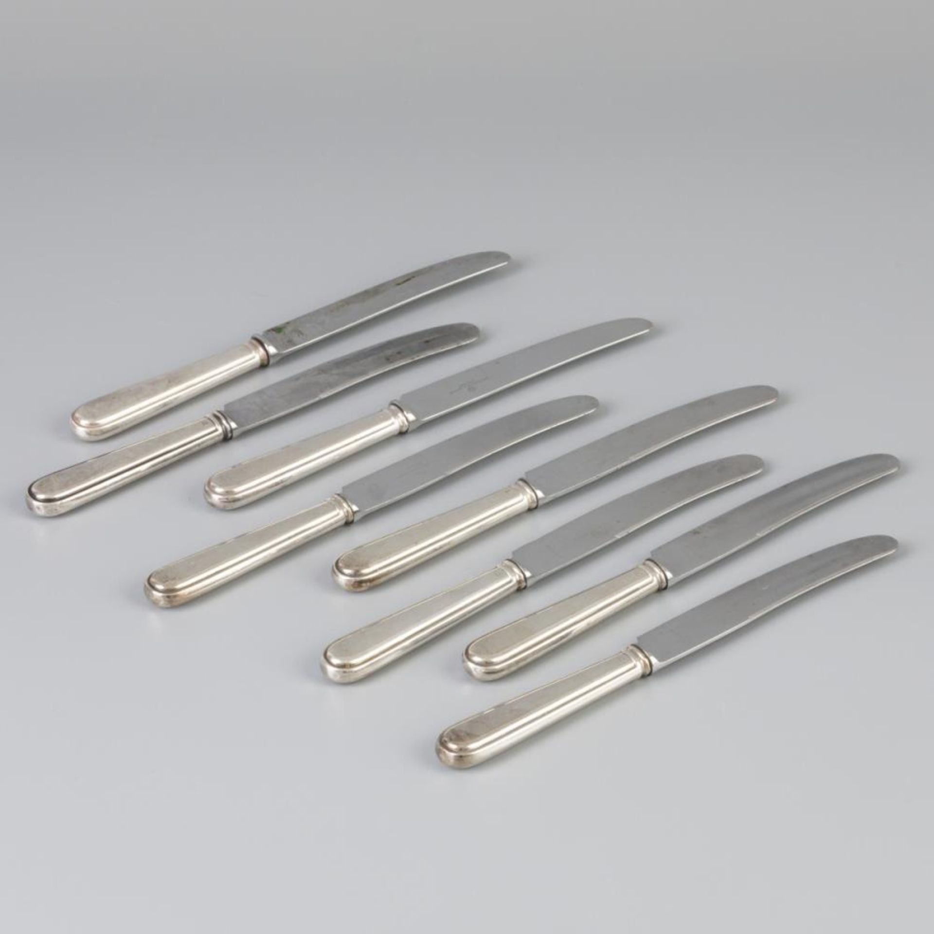 8 piece set of knives silver.
