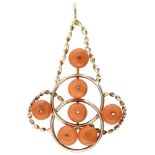 BLA 9K. bicolor gold pendant set with approx. 16.60 ct. red coral.
