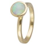 14K. Yellow gold solitaire ring set with precious opal.