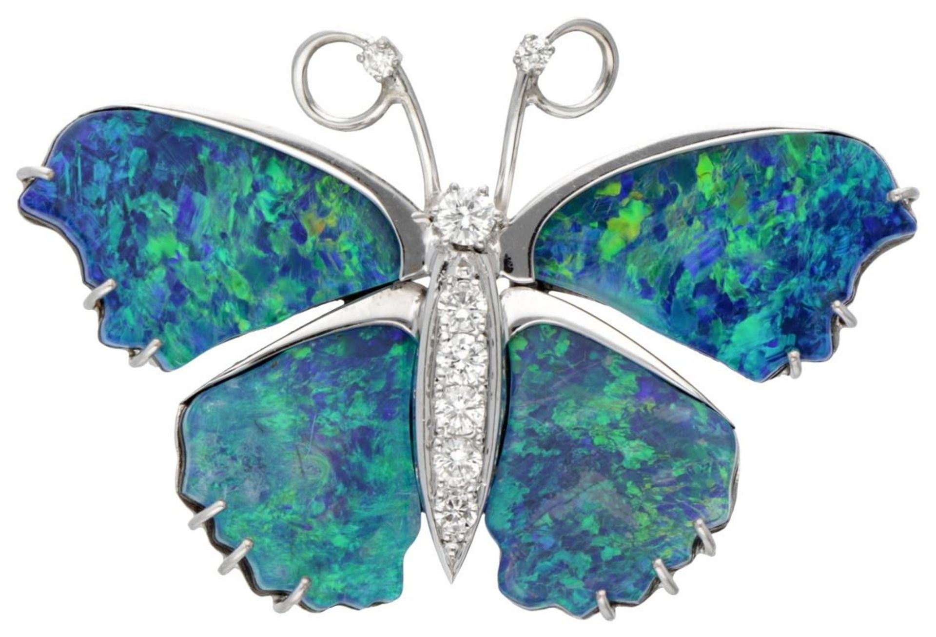 14K. White gold butterfly brooch set with approx. 0.50 ct. diamond and opal doublet.