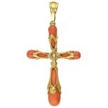 Antique cross-shaped red coral pendant in a 14K. yellow gold frame.