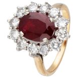 18K. Yellow gold entourage ring set with approx. 1.08 ct. diamond and ruby.