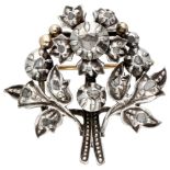 14K. Yellow gold/sterling silver antique brooch set with rose cut diamond.