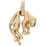 18K. Yellow gold panther pendant set with approx. 0.41 ct. diamond and ruby.