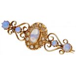 14K. Yellow gold antique brooch set with approx. 1.78 ct. water opal and seed pearls.