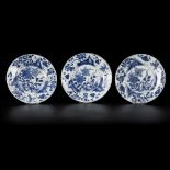 A set of (3) porcelain plates with floral and rock decoration, China, Kangxi.