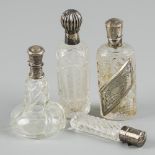 4-piece lot of perfume bottles silver.