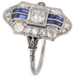 Pt 900 Platinum Art Deco dinner ring set with approx. 0.65 ct. diamond and sapphire.