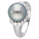 18K. White gold Damiani ring set with approx. 0.64 ct. diamond and Tahiti pearl.