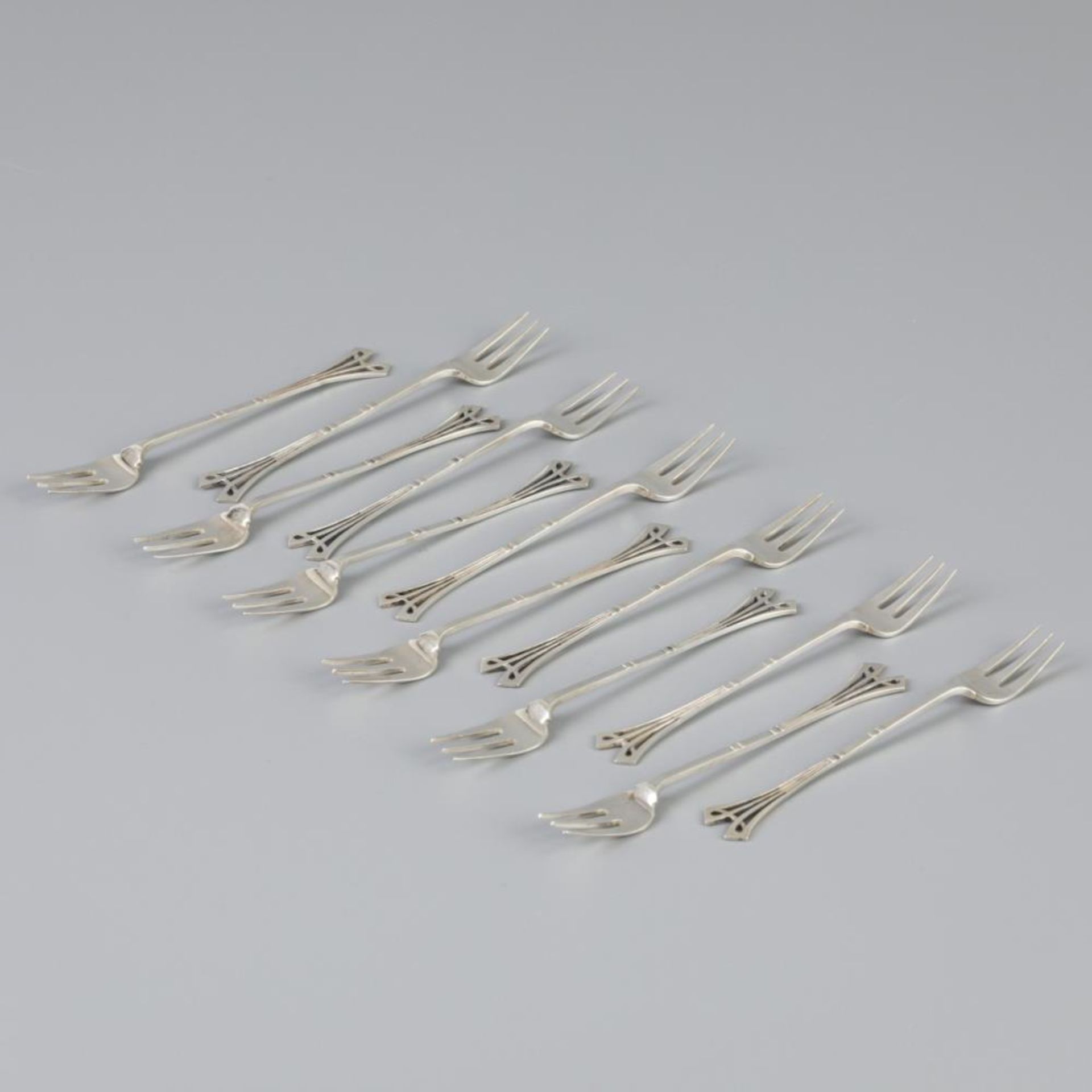 12 piece set silver pastry forks.