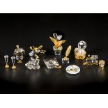 (9) piece lot Swarovski miniatures.