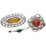 Lot of three silver Amsterdam School brooches with chrysoprase, agate and yellow stone.