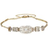 14K. Bicolor gold Art Deco bracelet set with rose cut diamonds.