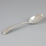 Vegetable serving spoon silver.