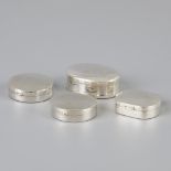 4 piece lot silver pill boxes.