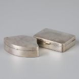 2 piece lot silver pill boxes.