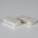 2 piece lot silver pill boxes.