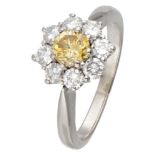 18K. White gold cluster ring set with approx. 0.85 ct. yellow and white diamond.