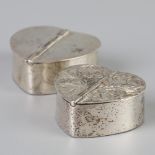 2 piece lot silver pill boxes.