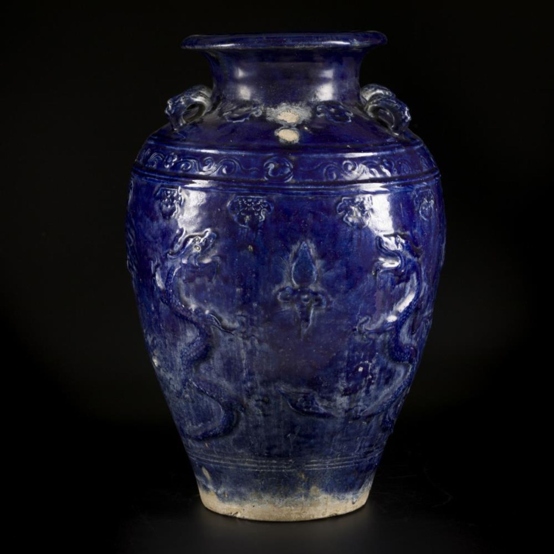 An earthenware blue glazed storage jar with dragon decoration, China, 19/20th century. - Image 5 of 18