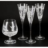 A set comprising cut glasses a.w. (3) champagne glasses and a brandy glass, France, late 20th centur