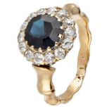 BLA 10K. yellow gold antique ring set with approx. 0.52 ct. diamond and approx. 2.00 ct. sapphire.