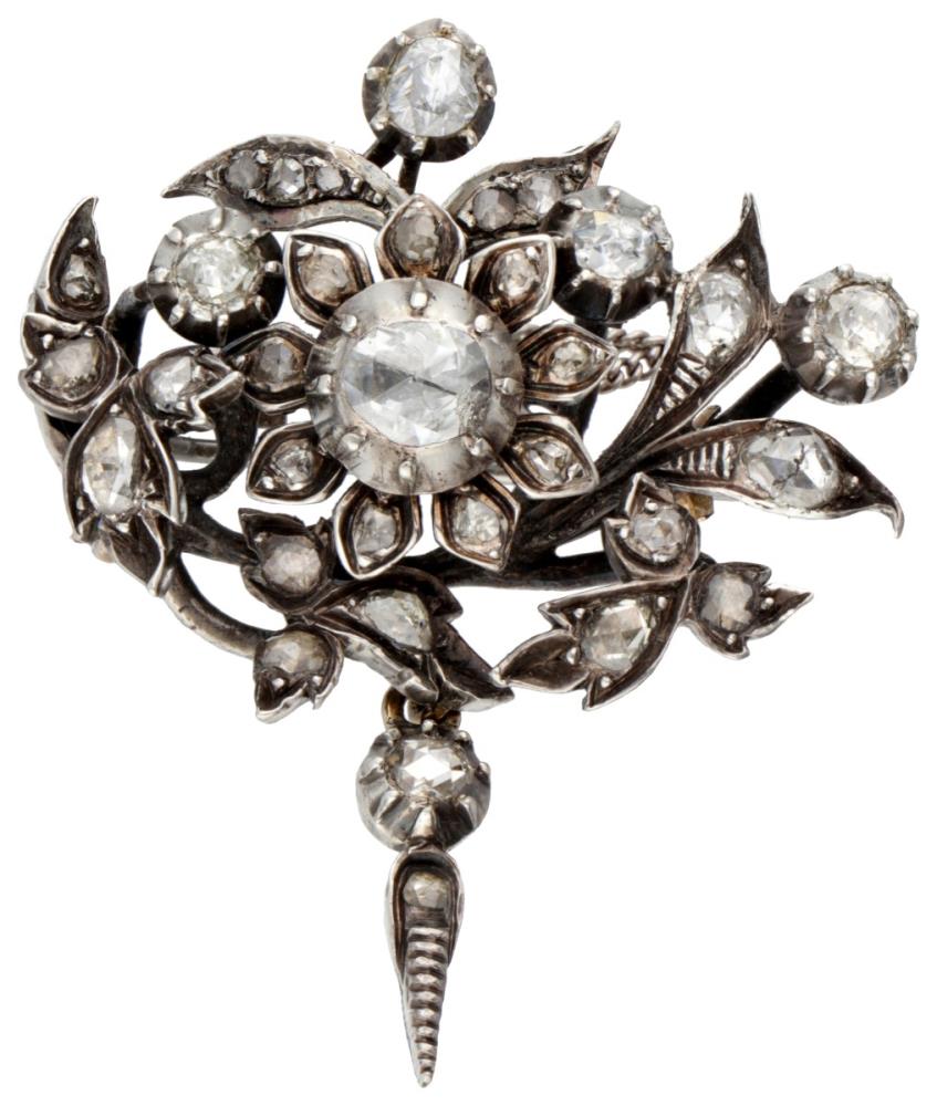 Antique 835 silver floral brooch set with rose cut diamond.