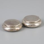 2 piece lot silver pill boxes.