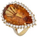 18K. Yellow gold Mimoza cocktail ring set with approx. 0.62 ct. diamond and colored stone.