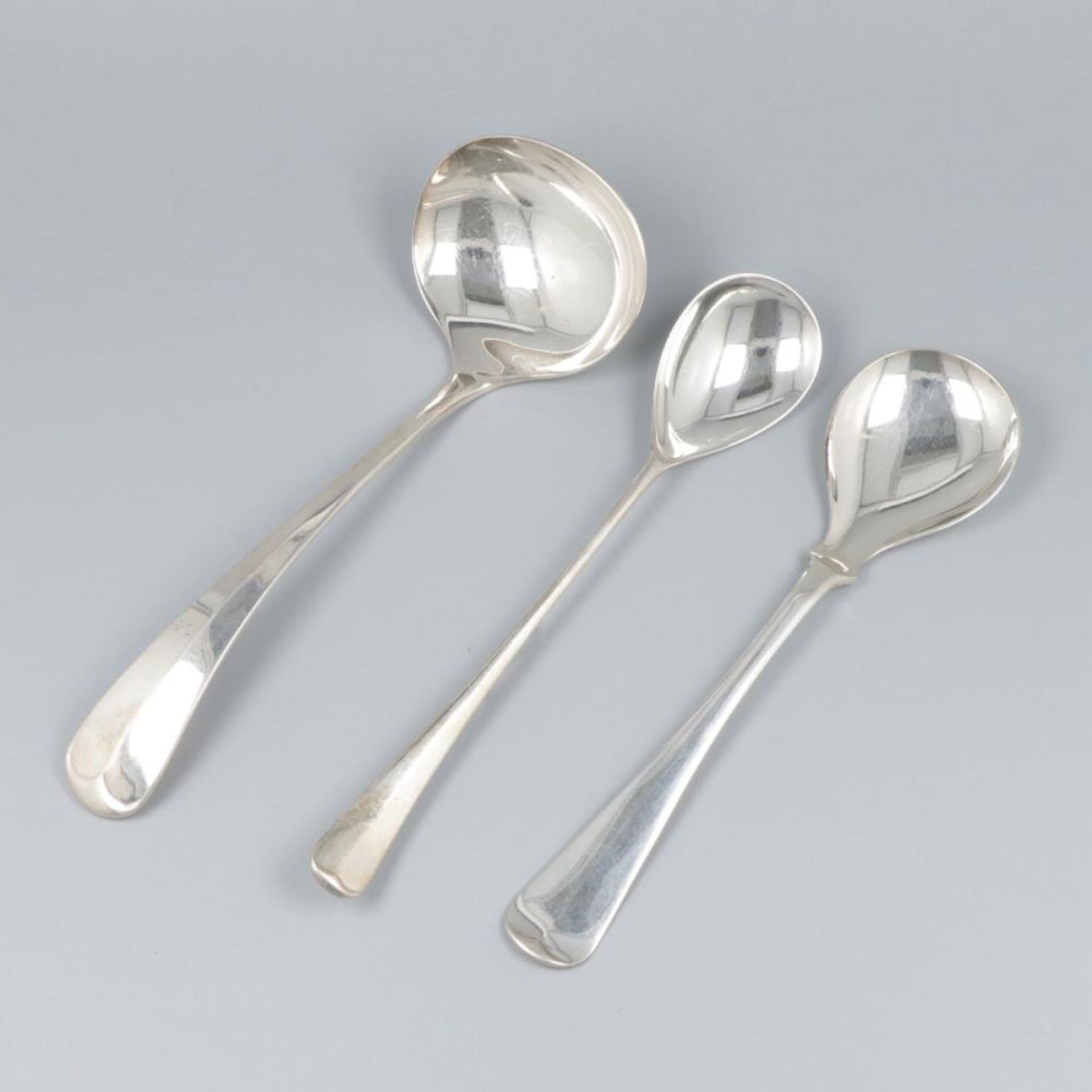 3-piece lot "Haags Lofje" silver / silver-plated spoons.