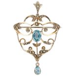 BLA 9K. yellow gold Edwardian brooch / pendant set with seed pearls and blue colored stones.