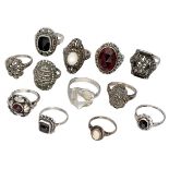 Lot of vintage silver rings, set with marcasite, garnet, onyx, moonstone and a cameo.
