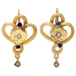 14K. Yellow gold Art Nouveau earrings set with seed pearls and blue rhinestones.