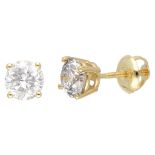 14K. Yellow gold solitaire earrings set with approx. 1.10 ct. diamond.