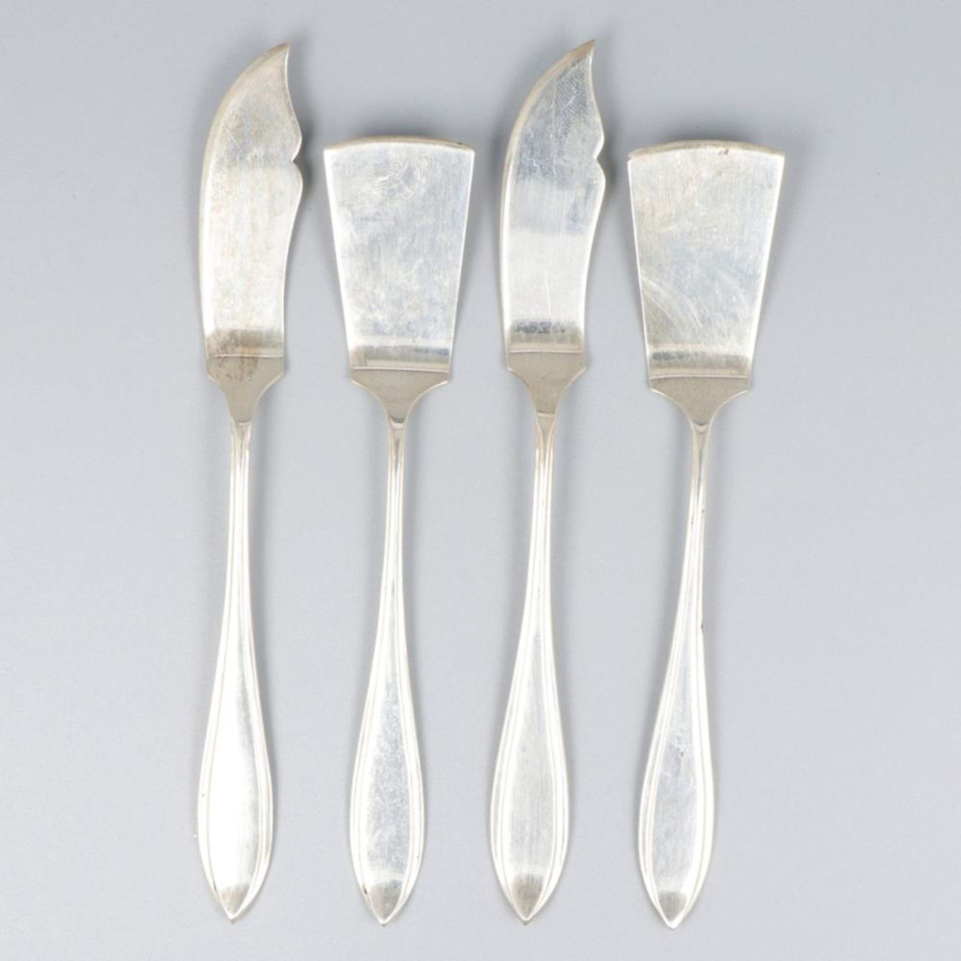 4-piece lot of butter knives & cheese picks, silver.