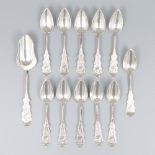 12-piece set of coffee spoons and sugar shovel silver.