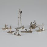 7-piece lot of silver miniatures.