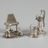 2-piece lot of silver miniatures.