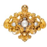 Antique 18K. yellow gold richly decorated brooch set with diamonds and pearls.