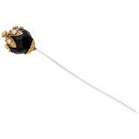 Antique mourning pin with a 14K. yellow gold cluster mount on jet and an 833 silver pin.