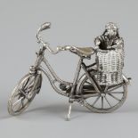 Bicycle with child seat silver.