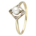 18K. Yellow gold antique ring set with diamonds and a white pearl.