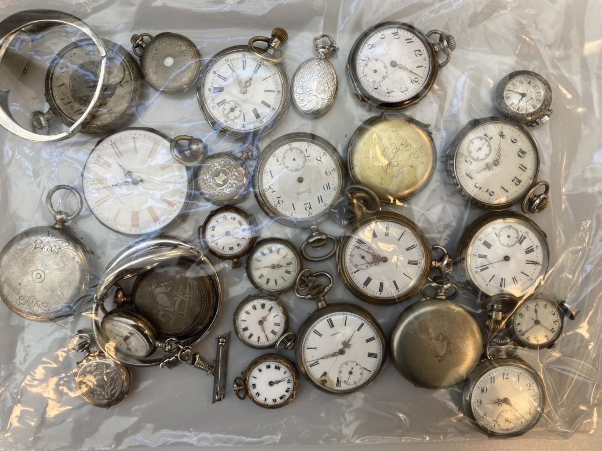 Lot (25) pocket watches.